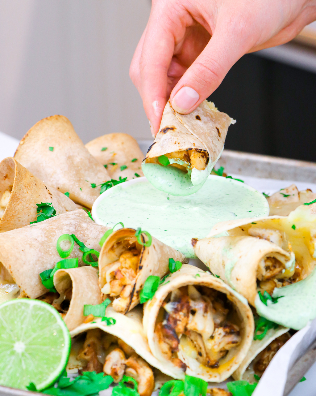 Sheet Pan Taquitos with CilantroYogurt Sauce (Gameday Recipes)